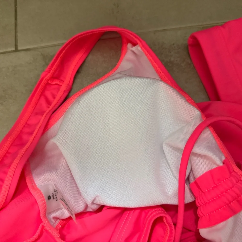 Pink swimsuit top and bottom